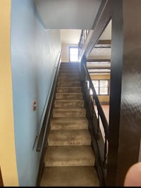 stairs leading up to a room in a house